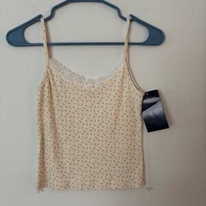 brand new! brandy melville cream floral lace trim and bow cami crop tank top.